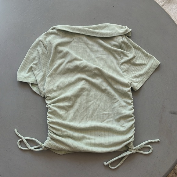 Caution to the wind slightly cropped polo shirt with drawstrings - Picture 2 of 2